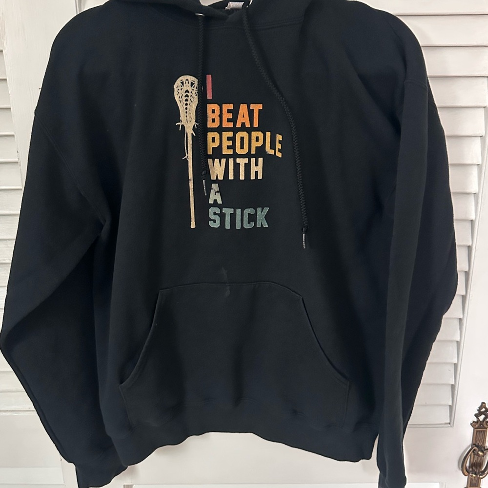 Lacrosse ‘I beat people with a stick’ hoodie in youth medium